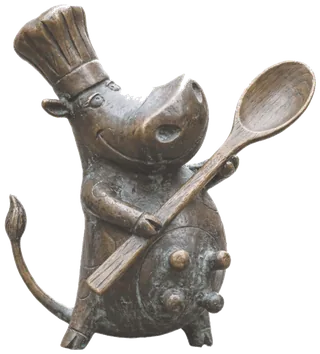 Krówka kucharka — figurka z brązu